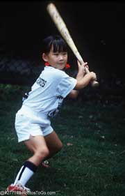 Girl playing baseball; Size=180 pixels wide